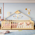 Lit cabane Montessori au sol avec barrières en bois naturel dans une chambre d'enfant